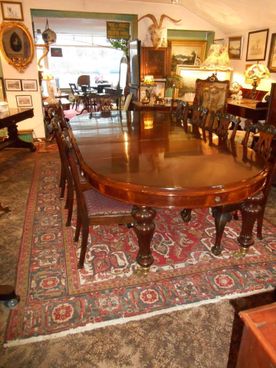 Beautiful table surrounded by chairs 