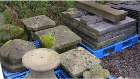 Concrete garden pieces on pallets