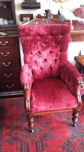 upholstered antique chair 